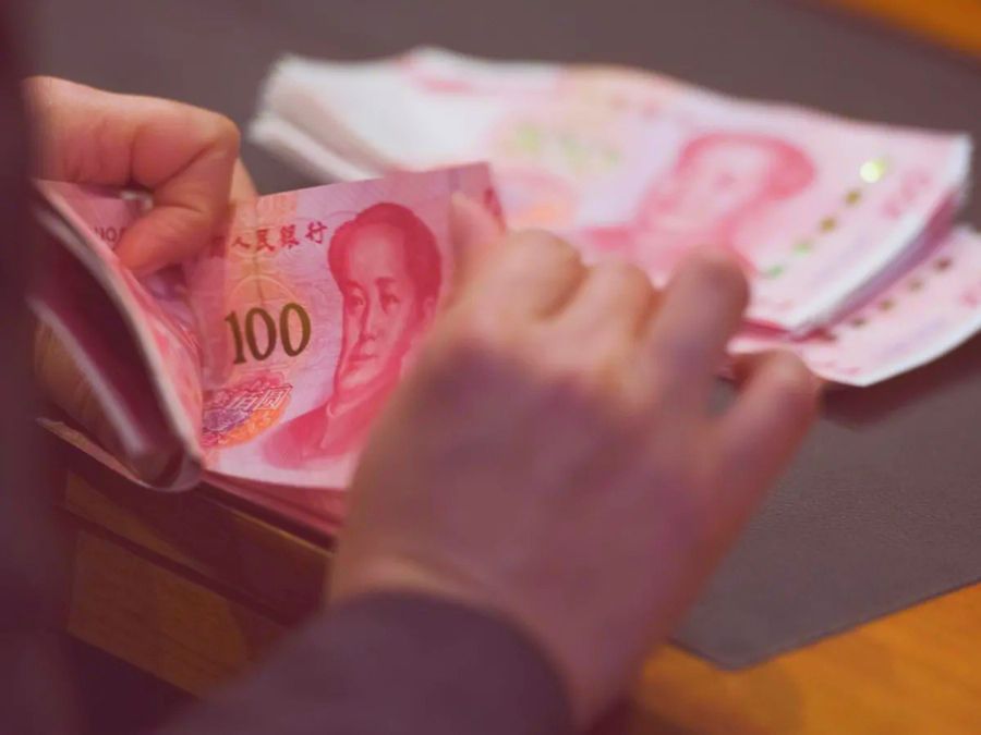 kurs yuan dan dollar